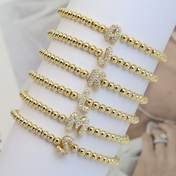 Wholesale Women's Copper Beaded Stringline Bracelet With Microinlaid Letters Numbers Text And Electroplating Treatment
