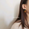 Wholesale Women's Copper Earrings Geometric Style Electroplating Oval Curved Morandi Oil Drop Design