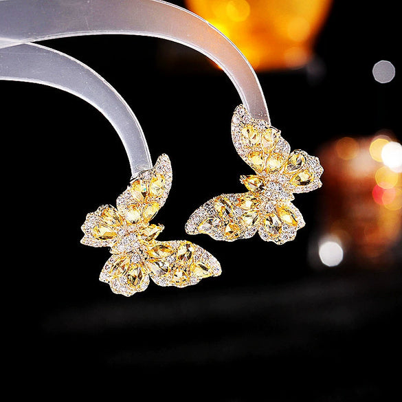 Wholesale Women's Copper Earrings With Bow Pattern And Zircon Treatment In Simple And Animal Style