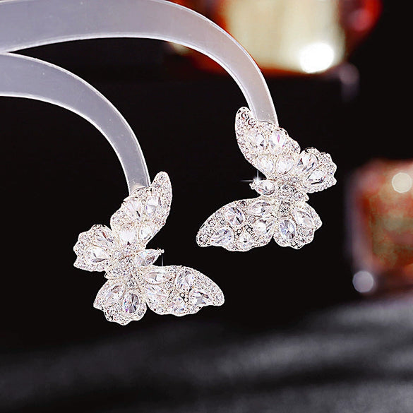 Wholesale Women's Copper Earrings With Bow Pattern And Zircon Treatment In Simple And Animal Style