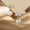 Wholesale Women's Copper Earrings With Flower And Geometric Pattern And Zirconia Design