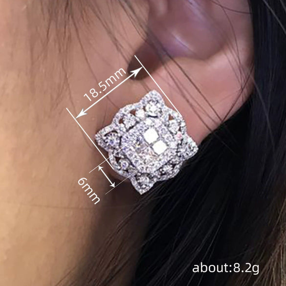 Wholesale Women's Copper Earrings With Flower Pattern And Inlaid Zircon French Cool Style