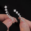 Wholesale Women's Copper Earrings With U Shaped Zircon Design And Four Claw Setting