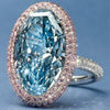 Wholesale Women's Copper Eggshaped Ring Inlaid With Blue Topaz And Pink Zircon In Geometric Style