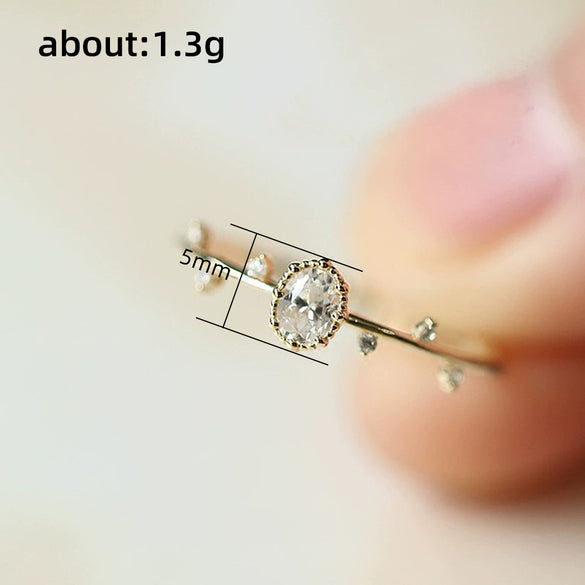 Wholesale Women's Copper Fresh Plant Flowers Style Geometric Oval Eggshaped Zircon Inlaid Ring