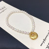 Wholesale Women's Copper Freshwater Pearl Elastic Bracelet With Blessing Lock And Lotus Sand Gold Colorpreserving Perfect Circle Shape