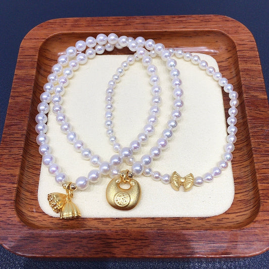 Wholesale Women's Copper Freshwater Pearl Elastic Bracelet With Blessing Lock And Lotus Sand Gold Colorpreserving Perfect Circle Shape