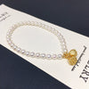 Wholesale Women's Copper Freshwater Pearl Elastic Bracelet With Blessing Lock And Lotus Sand Gold Colorpreserving Perfect Circle Shape