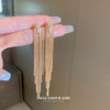 Wholesale Women's Copper Geometric Long Earrings With Electroplating And Tassel Design Light Luxury And Exaggerated Style