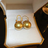 Wholesale Women's Copper Geometric Pearl Earrings With Diamond Design Retro And Exquisite Style