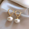 Wholesale Women's Copper Geometric Pearl Earrings With Diamond Design Retro And Exquisite Style