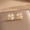 Wholesale Women's Copper Geometric Style Electroplated Fresh Flower And Lucky Grass Ear Studs And Earrings