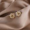 Wholesale Women's Copper Geometric Triangle Cat's Eye Stone Earrings Light Luxury Electroplated