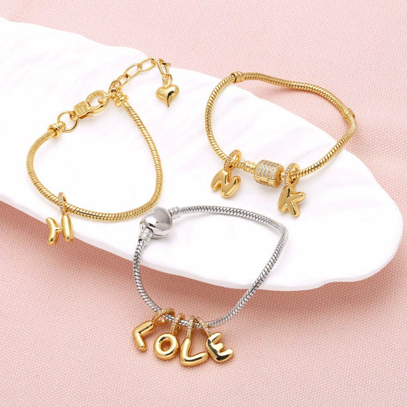 Wholesale Women's Copper Goldplated Geometric Letter Pendant Bracelet With Electroplating