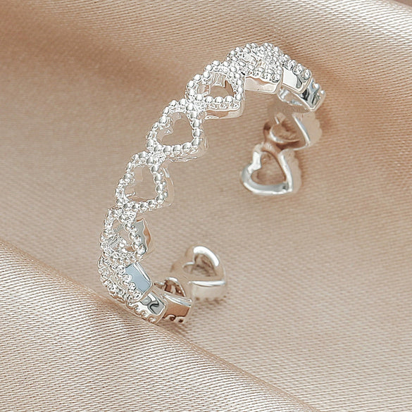 Wholesale Women's Copper Heart Shaped Hollow Love Stitching Electroplated Ring