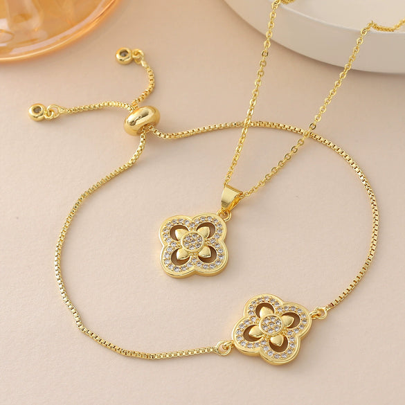Wholesale Women's Copper 18K Gold Plated Fourleaf Clover Pendant Necklace And Bracelet Set With Ochain