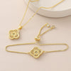 Wholesale Women's Copper 18K Gold Plated Fourleaf Clover Pendant Necklace And Bracelet Set With Ochain