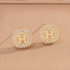 Wholesale Women's Copper Letter Earrings With 18K Gold Plating And Zircon Light Luxury And Simple Style