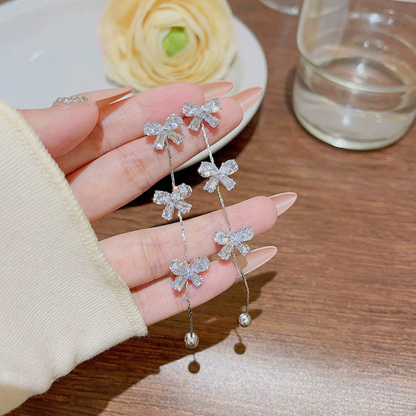 Wholesale Women's Copper Light Luxury Bow Tassel Earrings Inlaid Zircon