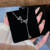 Wholesale Women's Copper Mixed Gemstone Setting Zircon Heart Shape Tassel Cross Chain Necklace