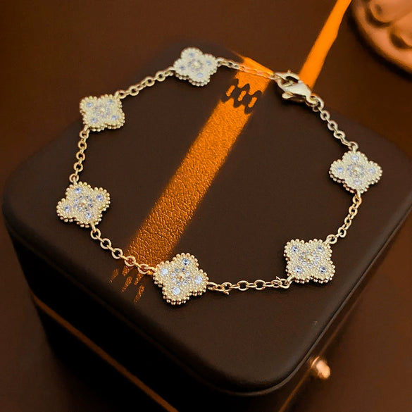 Wholesale Women's Copper Plastic Zircon Fritillary Flower Geometric Style High Sense Electroplated Bracelet