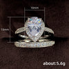 Wholesale Women's Copper Plated Champagne Gold Ring With Single Row Micro Inlaid Water Drop Zircon