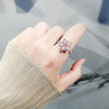 Wholesale Women's Copper Rotating Flower Decompression Antianxiety Ring Set With Pink Zircon And Electroplating Treatment