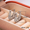 Wholesale Women's Copper Vintage Hollow Woven Pattern Ushaped Electroplated Earrings