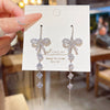 Wholesale Women's Copper Zircon Bow Long Tassel Earrings