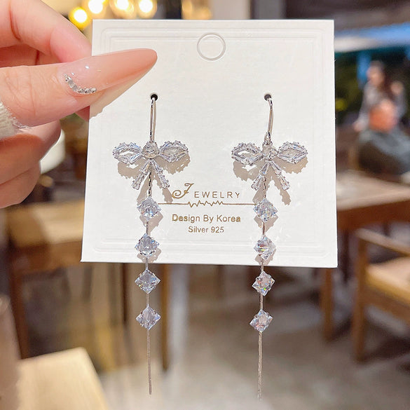Wholesale Women's Copper Zircon Bow Long Tassel Earrings