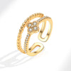 Wholesale Women's Copper Zircon Fourleaf Clover Geometric Ring With Electroplating