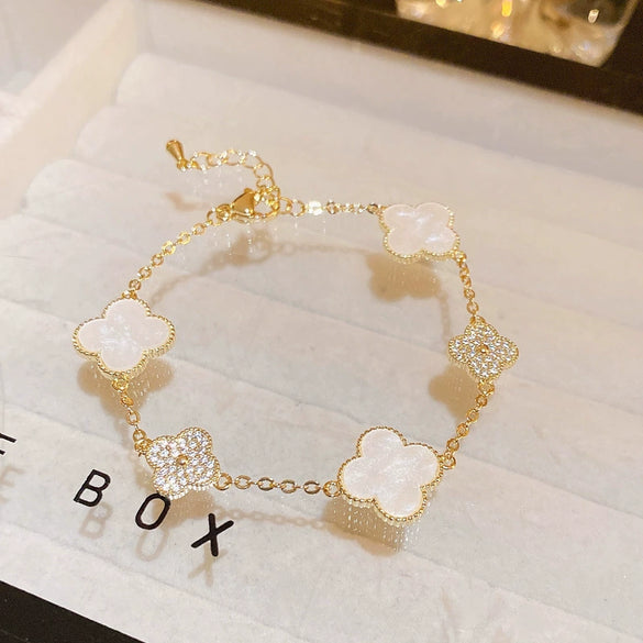 Wholesale Women's Copper Zircon Inlaid Fourpetal Flower Geometric Sweet Style Bracelet Real Gold Electroplated