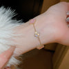 Wholesale Women's Copper Zircon Inlaid Fourpetal Flower Geometric Sweet Style Bracelet Real Gold Electroplated