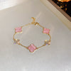 Wholesale Women's Copper Zircon Inlaid Fourpetal Flower Geometric Sweet Style Bracelet Real Gold Electroplated