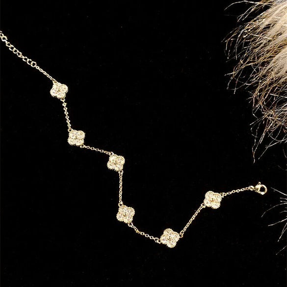 Wholesale Women's Copper Zircon Inlaid Fourpetal Flower Geometric Sweet Style Bracelet Real Gold Electroplated