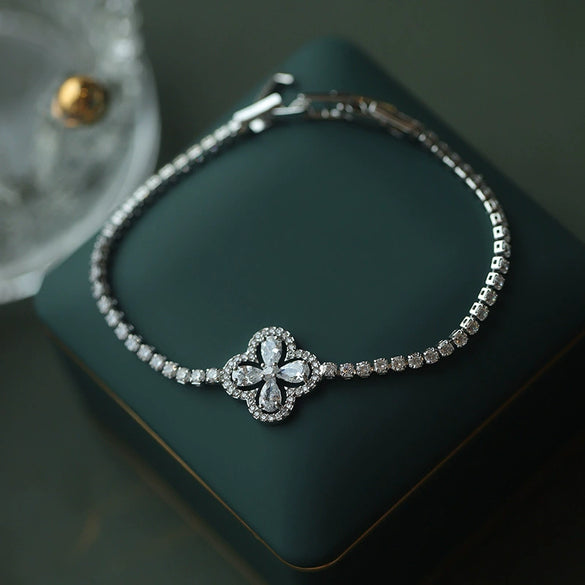 Wholesale Women's Copper Zircon Inlaid Fourpetal Flower Geometric Sweet Style Bracelet Real Gold Electroplated