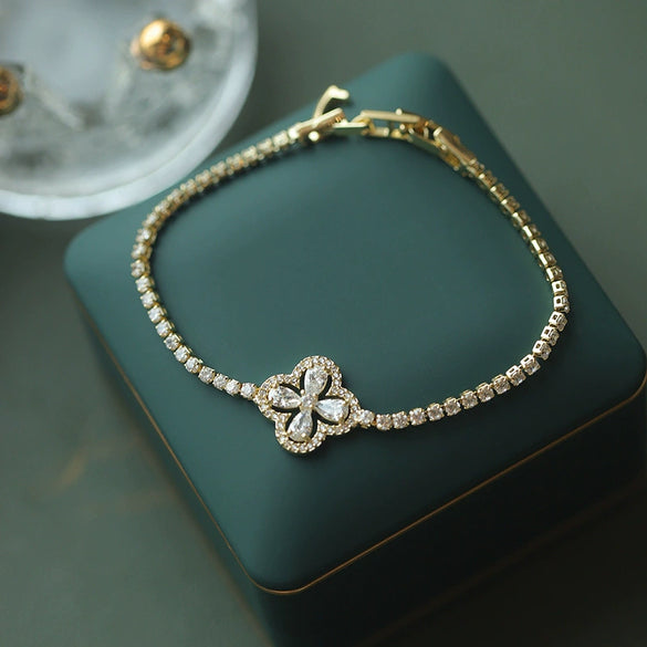 Wholesale Women's Copper Zircon Inlaid Fourpetal Flower Geometric Sweet Style Bracelet Real Gold Electroplated