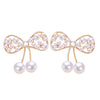 Wholesale Women's Cute Bow Natural Freshwater Pearl Earrings In 18K Gold Color Oblate Shape