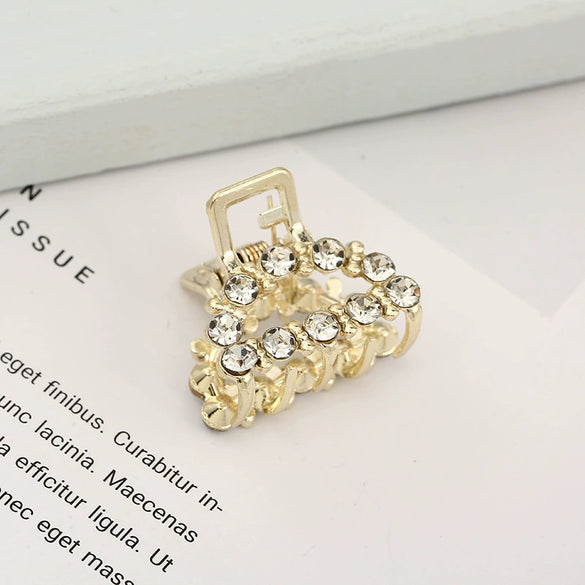Wholesale Women's Cute Pearl Rhinestone Side Hair Clip Hair Accessories With Electroplating Treatment