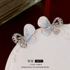 Wholesale Women's Diecast Silver Needle Blue Crystal Flower Pearl Earrings With Diamond Design And High Sense Style