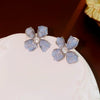 Wholesale Women's Diecast Silver Needle Blue Crystal Flower Pearl Earrings With Diamond Design And High Sense Style