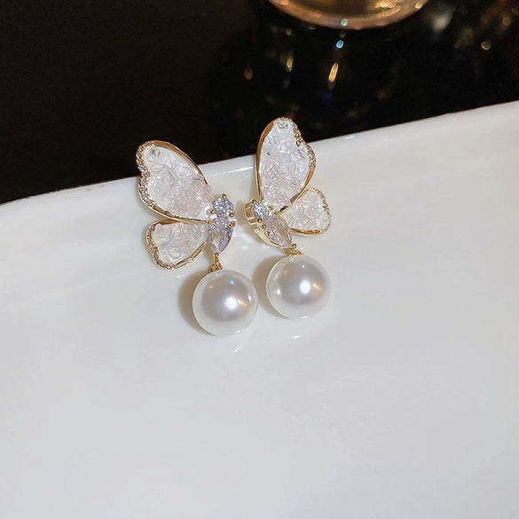 Wholesale Women's Diecast Silver Needle Blue Crystal Flower Pearl Earrings With Diamond Design And High Sense Style