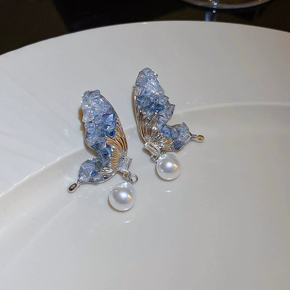 Wholesale Women's Diecast Silver Needle Blue Crystal Flower Pearl Earrings With Diamond Design And High Sense Style