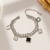 Wholesale Women's Double Layer Four Leaf Flower Titanium Steel Bracelet With Black And White Shellfish Design Electroplated For Fashion And Classic All Match