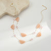 Wholesale Women's Doublelayer Geometric Resin And 18K Gold Electroplated Heart Crystal Sweater Necklace