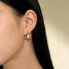 Wholesale Women's Dropshaped Diamondinlaid Copper Hollow Earrings With Minimalist Design