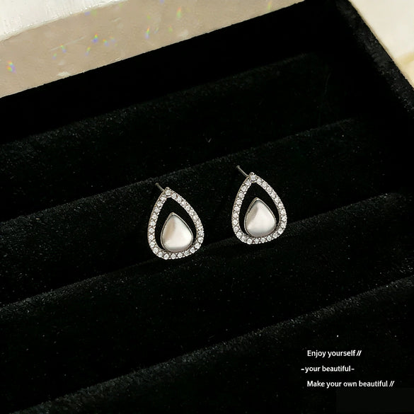 Wholesale Women's Dropshaped Diamondinlaid Copper Hollow Earrings With Minimalist Design