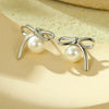 Wholesale Women's Elegant Bow Pearl Titanium Steel Electroplated Earrings Fashion Simple No Fading