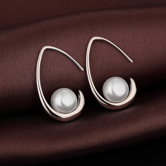 Wholesale Women's Elegant Casual Imitation Pearl Geometric Copper Electroplated Earrings