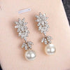 Wholesale Women's Elegant Geometric Plant Flowers Imitation Pearl Copper Electroplated Wedding Dress Earrings